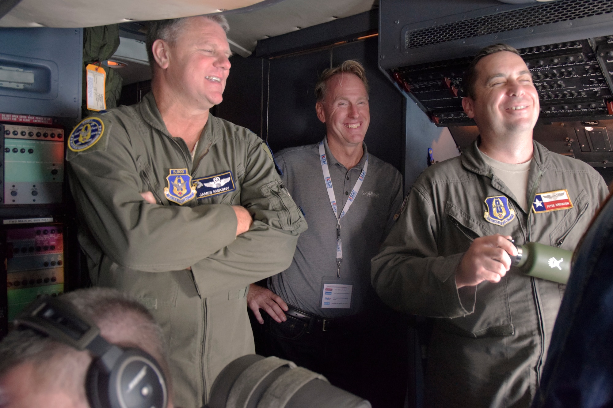 U.S. Air Force Lt. Col. James Kwasny, Air Force Reserve Command Safety Risk Management manager and Capt. Peter Anderson, 68th Airlift Squadron pilot, speak with Mike Reenders, SkyWest Airlines captain, aboard a C-5M Super Galaxy aircraft during an Operation Boss Lift flight from Joint Base San Antonio-Lackland, Texas, Aug. 4, 2018. The event, a combined effort of the Employer Support of the Guard and Reserve program and the 433rd Airlift Wing, promotes cooperation and understanding between Reserve Component Service members and their civilian employers. (U.S. Air Force photo by Staff Sgt. Lauren M. Snyder)