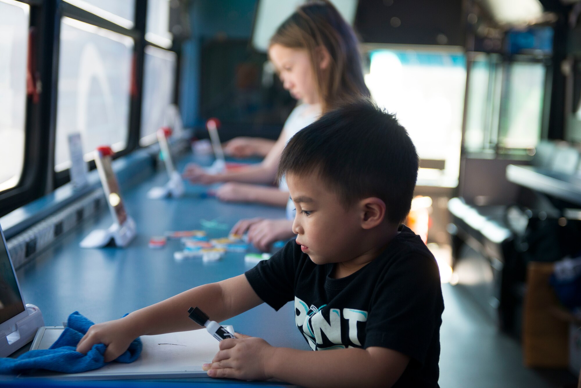 The Youth Center hosted the Micron STEM Bus tour with different stations set up for students to explore different aspects of science, technology, engineering and math.
