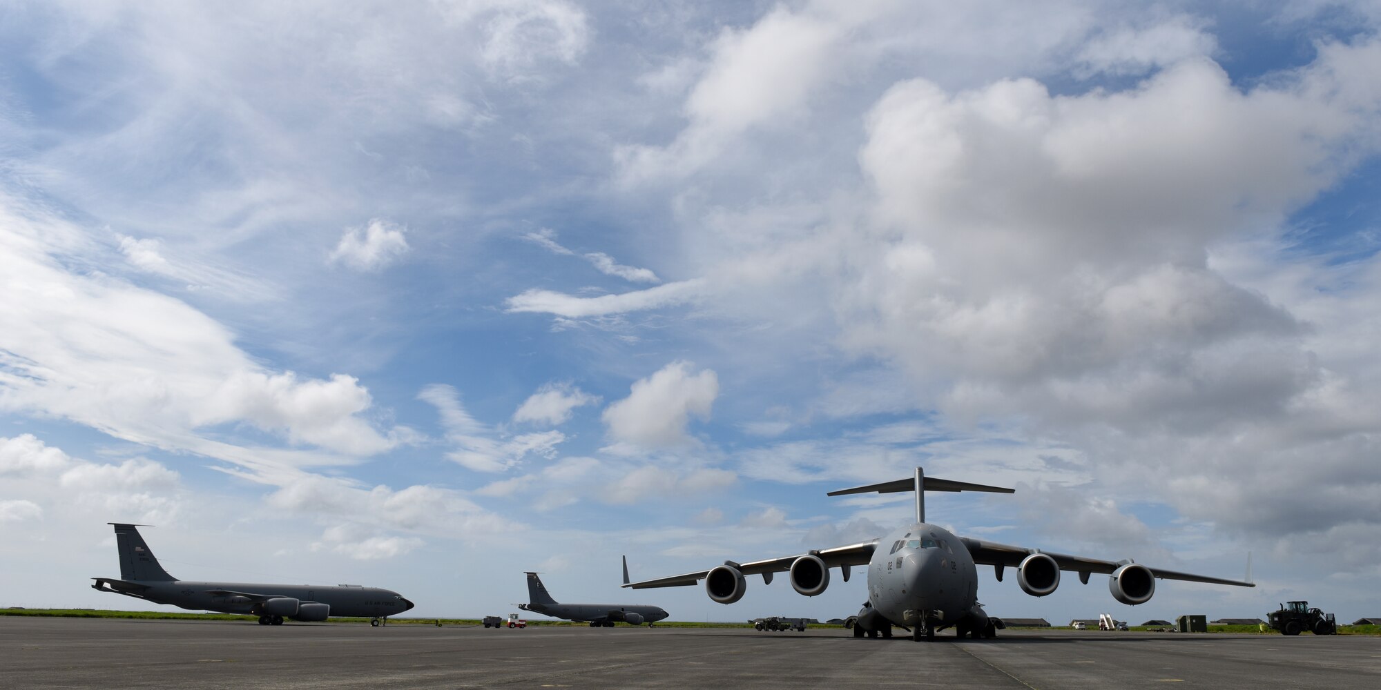 A C-17 Globemaster III from the Heavy Airlift Wing, Pápa Air Base, Hungary, and two KC-135 Stratotankers from the 100th Air Refueling Wing, Royal Air Force Mildenhall, England, sit on the flightline at Keflavik Air Base, Iceland, July 31, 2018, in support of NATO’s Icelandic Air Surveillance mission. The 493rd Expeditionary Fighter Squadron airlifted in all the equipment needed to operate the full-scale IAS mission from the installation. (U.S. Air Force photo/Staff Sgt. Alex Fox Echols III)