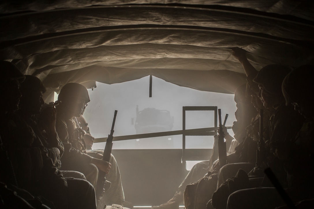 U.S. Marines with Marine Wing Support Squadron 171 ride in a 7-ton truck during Exercise Eagle Wrath 18 at Combined Arms Training Center Camp Fuji, Japan, July 18, 2018. Eagle Wrath 18 is an annual training exercise designed to increase squadron proficiency in a forward operating environment, test forward command and control structure, and practice for real-world contingency missions.