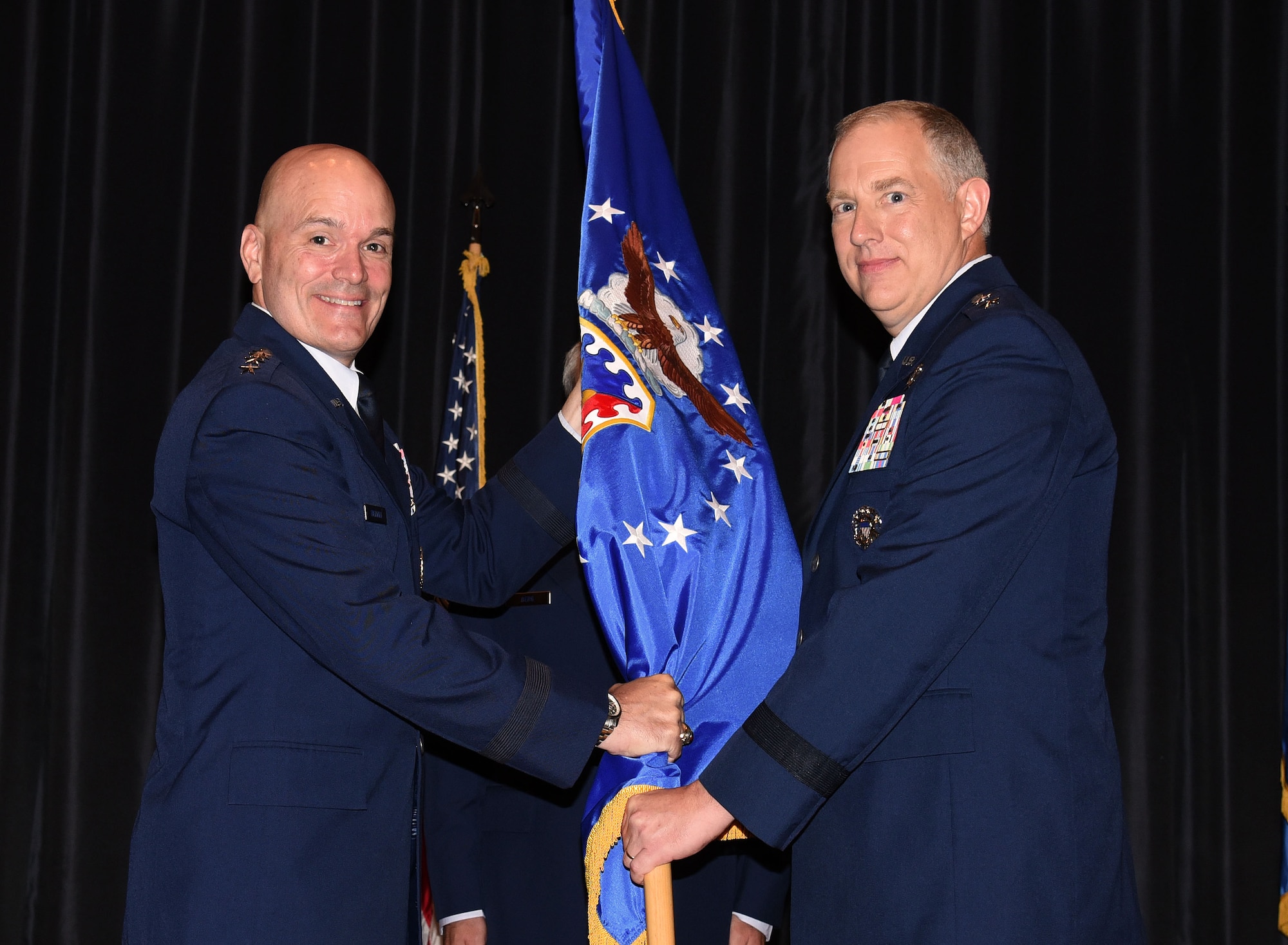 Maj. Gen. John R. Gordy assumed command of the U.S. Air Force Expeditionary Center during a change of command ceremony here Aug. 9. Gen. Carlton D. Everhart II, Air Mobility Command commander, presided over the ceremony in which Maj. Gen. Christopher J.  Bence relinquished command of the USAF EC to Gordy. (U.S. Air Force photo by Tech. Sgt. Jamie Powell)