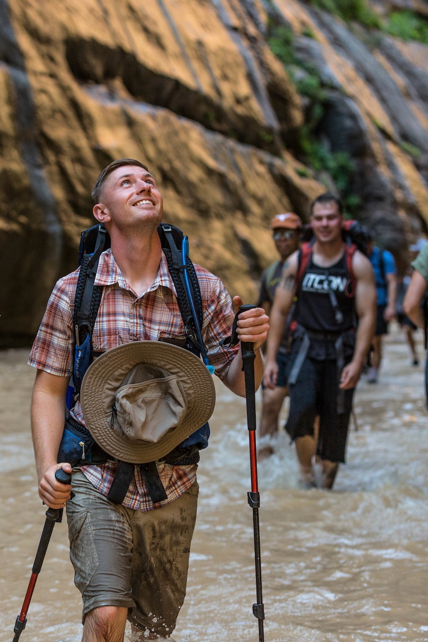 Marine Corps Sgt. Brehm Rhett, ground radio repairman, 1st Intelligence Battalion, I Marine Expeditionary Force-Information Group, Marine Corps Base Camp Pendleton, Calif., admires the canyon walls during a hike at Zion National Park, Utah.