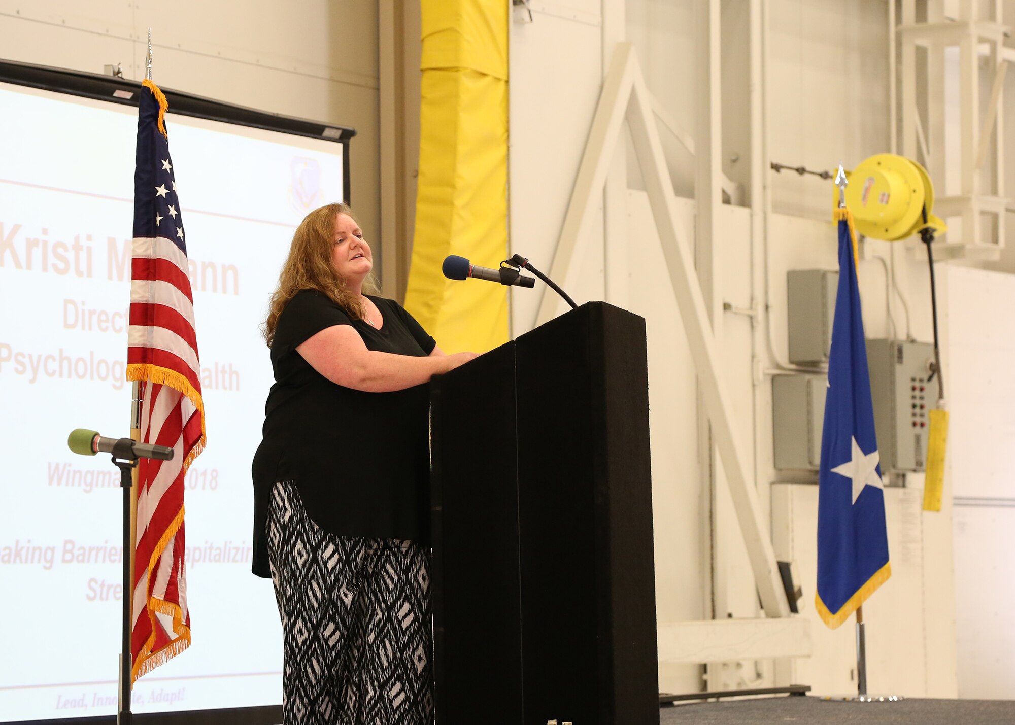 Ms. Kristi McCann speaks to Airmen about wellness.