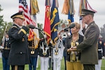 Current chairman of the Joint Chiefs of Staff Marine Corps Gen. Joe Dunford, right, takes the oath of office from his predecessor, Army Gen. Martin E. Dempsey during a change of office and retirement ceremony at Joint Base Myer-Henderson Hall in Arlington, Va., Sept. 25, 2015.