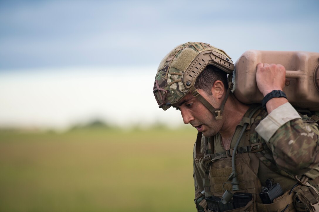1st Lt. Andrew Janosick, 20th Air Support Operations Squadron (ASOS) joint terminal attack controller (JTAC), executes a ruck march during Draco Spear, Aug. 3, 2018, at Moody Air Force Base, Ga. Draco Spear is a revival of the mid-2000s joint-training event Dragon Challenge that tested the top JTACs from various air support operations squadrons both mentally and physically. (U.S. Air Force photo by Senior Airman Janiqua P. Robinson)