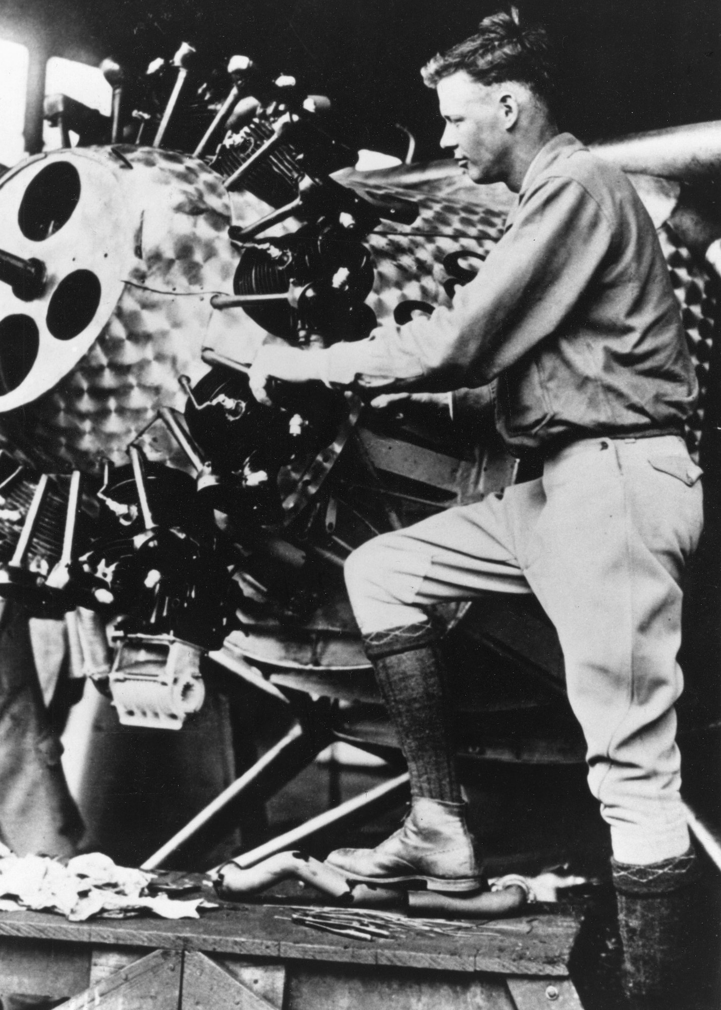 Capt. Charles A. Lindbergh performs maintenance on the Spirit of St. Louis. Lindbergh flew the aircraft in a transatlantic flight from in 1927, completing the first nonstop flight between New York to Paris. Lindbergh’s military service included being a member of the Missouri National Guard’s 110th Observation Squadron, which today is the 110th Bomb Squadron at Whiteman Air Force Base, Missouri, and is known as “Lindbergh’s Own.” (131st Bomb Wing archive photo)