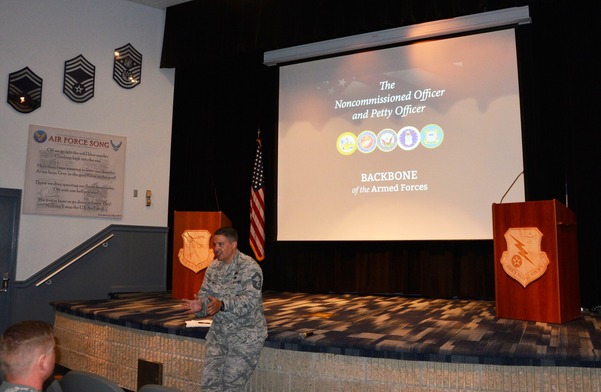 Senior Master Sgt. Justin Price, 1st Air force Logistics Directorate, makes opening comments to students during the first day of “Backbone University” July 24. Price helped lead the effort to offer the course here based on his positive experience with it at a previous assignment. Backbone University is a professional military education opportunity to gather and educate mid-level NCOs and petty officers from across NORAD and U.S. military services about joint operations and interoperability in a no-syllabus, open-ended forum. Its content is based on the senior enlisted advisor to the Chairman of the Joint Chiefs of Staff handbook, “The Noncommissioned Officer and the Petty Officer, BACKBONE of the Armed Forces.” Local senior enlisted facilitators each presented a chapter to the whole group, and then participants split into smaller, open-discussion groups. This class included Canadian military, U.S. Coast Guard, U.S. Air Force and U.S. Navy. (Air Force photo by Mary McHale)