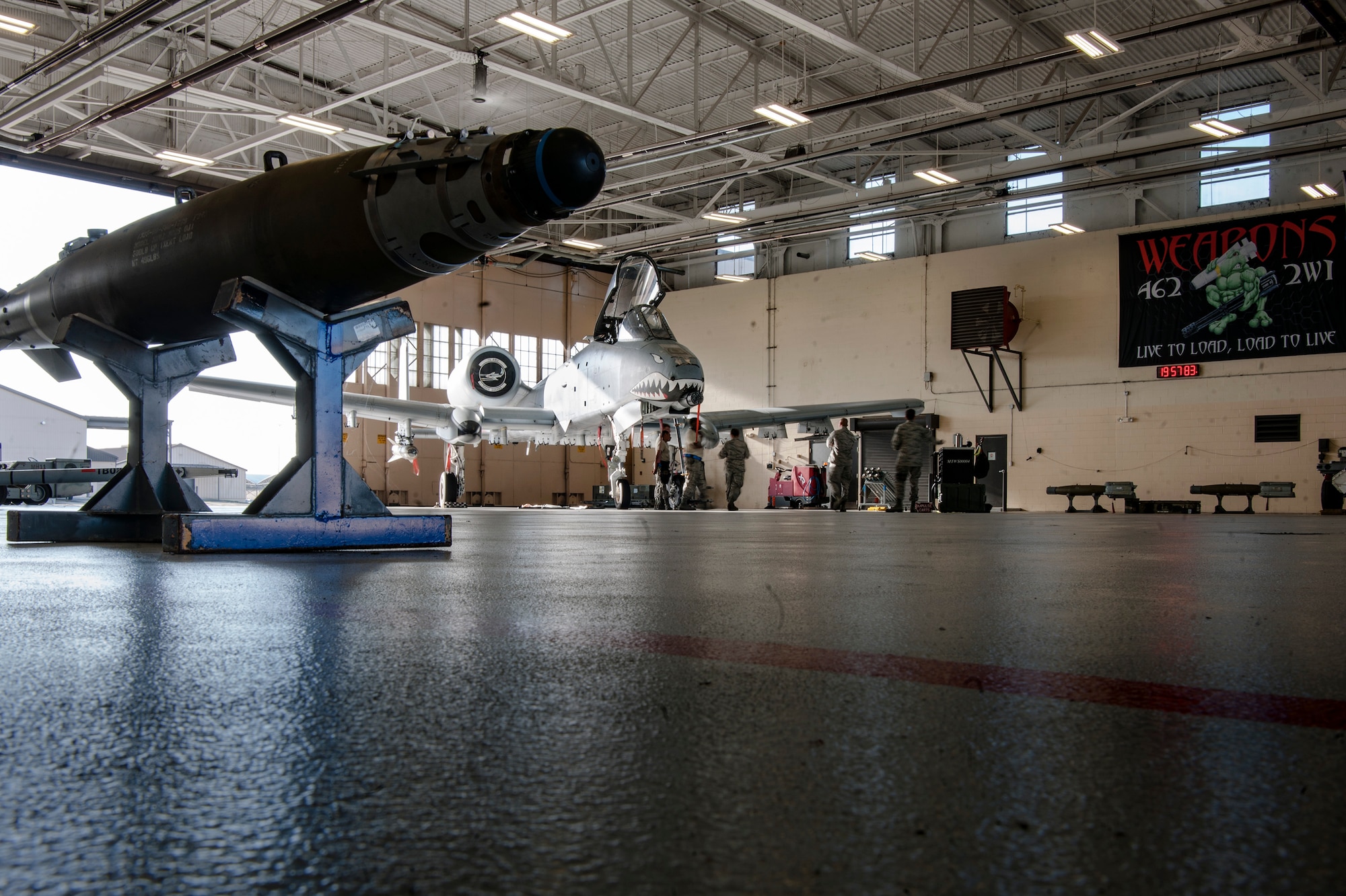 A bomb rests on a stand at the weapons standardization section, Aug. 7, 2018, at Moody Air Force Base, Ga. The weapons standardization section ensures weapons load crews are combat ready through evaluations consisting of MPRLs, semi-annual evaluations and flightline inspections. (U.S. Air Force photo by Airman Taryn Butler)