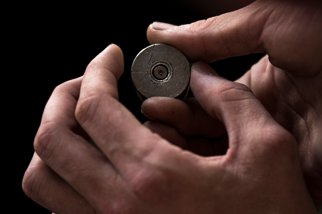 Senior Airman Robert Monk, 23d Aircraft Maintenance Squadron weapons load crew member, inspects an impulse cart during a Monthly Proficiency Required Load (MPRL), Aug. 7, 2018, at Moody Air Force Base, Ga. The weapons standardization section ensures weapons load crews are combat ready through evaluations consisting of MPRLs, semi-annual evaluations and flightline inspections. (U.S. Air Force photo by Airman Taryn Butler)