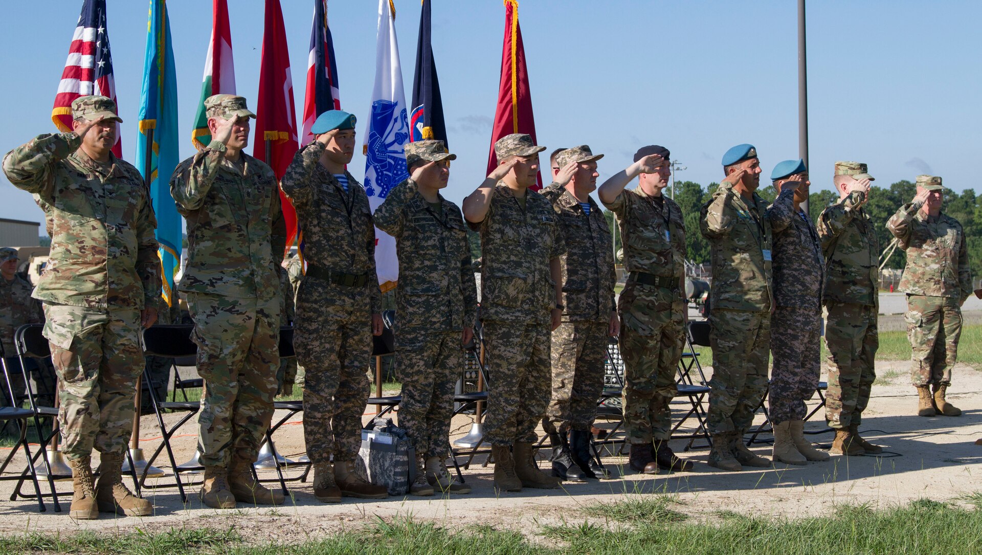The delegation of participating nations salutes as the national anthem of each participating nation is played during the opening ceremony of Exercise STEPPE EAGLE 18.  The U.S., United Kingdom and Central Asian States partners are commiteed to promoting security, stability and out mutual interests in the region.