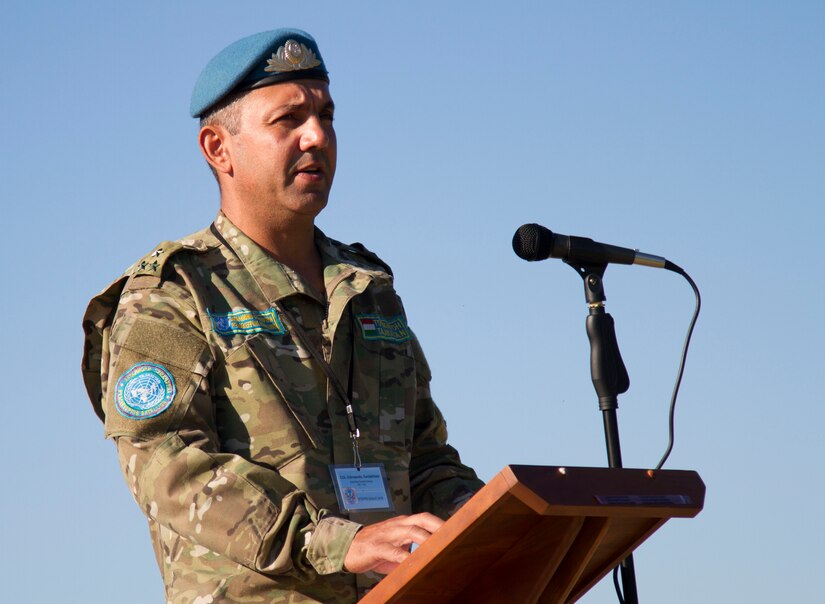 Col. Saidakhtam Odinazoda, Tajikistan Armed Forces, addresses the formation during the opening ceremony of Exercise STEPPE EAGLE 18. Contributing to regional and world stability, improving operational readiness, and enhancing understanding of each other's armed forces with the Republic of Tajikistan and other partner nations participating are shared common goals.
