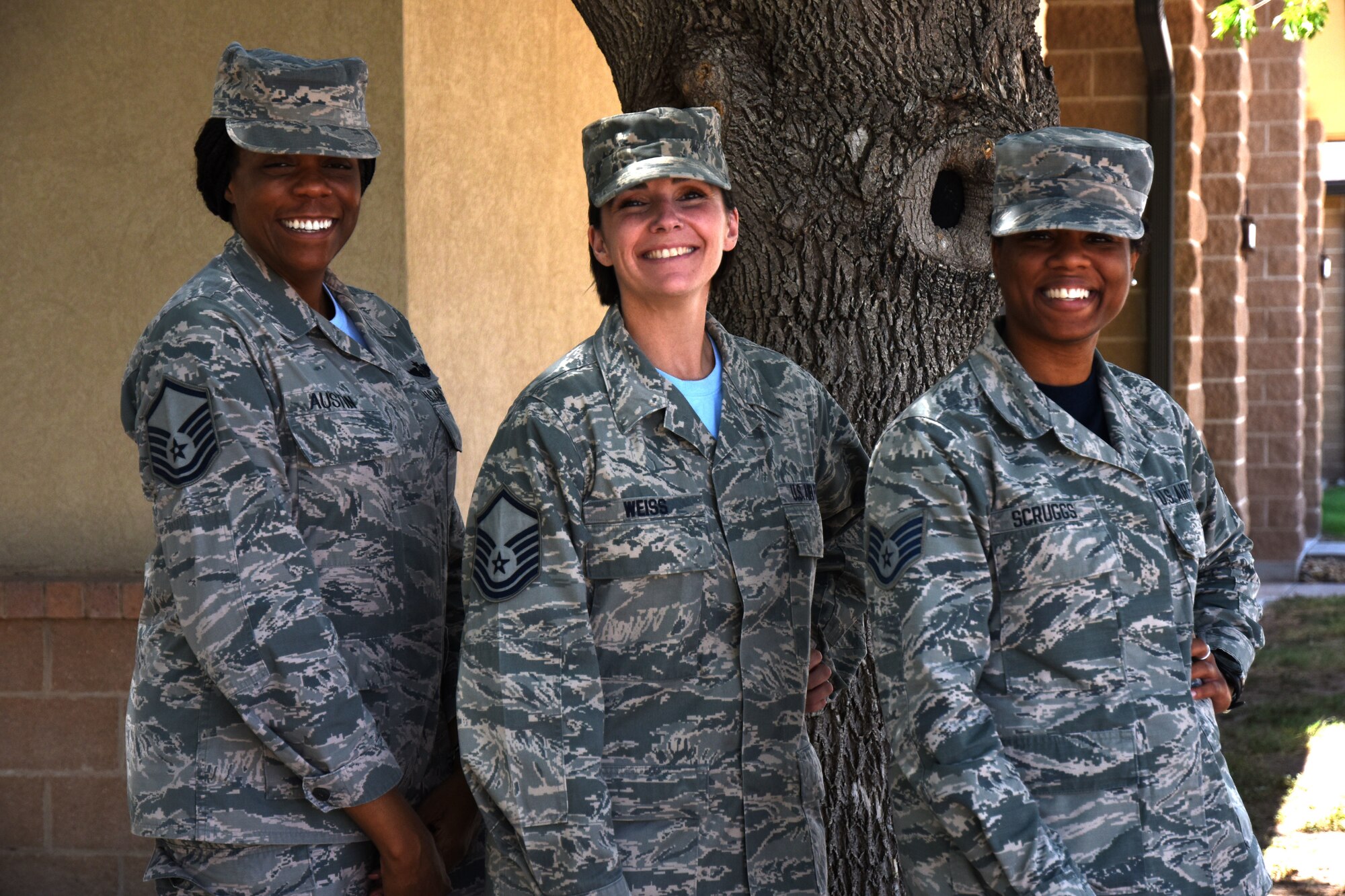 U.S. Air Force Master Sgt. Christine Austin, 316th Training Squadron flight chief, Master Sgt. Erin Weiss, 316th TRS flight chief, and Staff Sgt. Sabrina Scruggs, 315th Training Squadron instructor, stand outside of Smoothies & Things after a meeting on Goodfellow Air Force Base, July 20, 2018. These three individuals are the team responsible for coordinating a new program that allows Goodfellow Airmen to attend events and receive mentorship about a variety of subjects relating to their career in the Air Force. (U.S. Air Force photo by Airman 1st Class Seraiah Hines/Released)