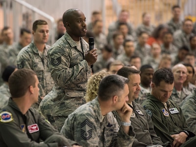 U.S. Air Force Tech. Sgt. William Sims asks the Secretary of the Air Force Heather Wilson a question during a Town Hall meeting at Joint Base Elmendorf-Richardson, Alaska, Aug. 9, 2018. During her visit to JBER, Wilson engaged with local leaders, visited several units highlighting the unique capabilities and held a town hall meeting. At the town hall meeting Wilson talked about the importance of readiness, modernization and innovation in order to remain the greatest Air Force in the world.