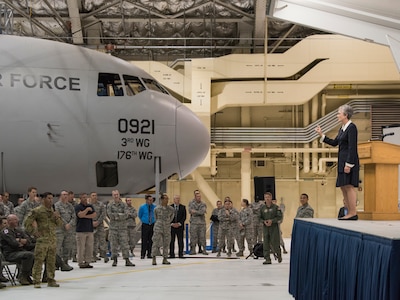 An Airman asks the Secretary of the Air Force Heather Wilson a question during a Town Hall meeting at Joint Base Elmendorf-Richardson, Alaska, Aug. 9, 2018. During her visit to JBER, Wilson engaged with local leaders, visited several units highlighting the unique capabilities and held a town hall meeting. At the Town Hall meeting Wilson talked about the importance of readiness, modernization and innovation in order to remain the greatest Air Force in the world.
