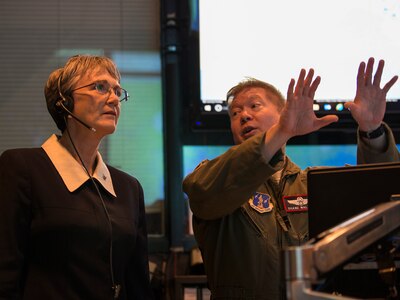 Secretary of the Air Force Heather Wilson speaks with U.S. Air Force Lt. Col. Shane Wallace, the 176th Air Defense Squadron director of operations at Joint Base Elmendorf-Richardson, Alaska, Aug. 9, 2018. During her visit Wilson met with JBER Airmen and personally saw the unique capabilities they bring to the Pacific theater.