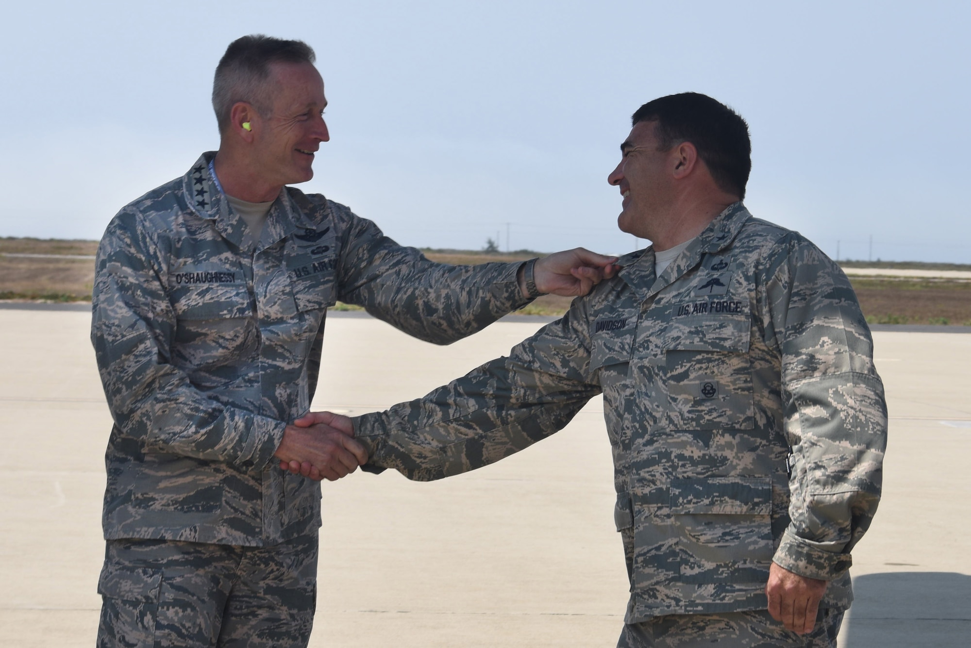 Brig. Gen. Matthew Davis, 14th Air Force vice commander, greets Gen. Terrence J. O’Shaughnessy, commander of U.S. Northern Command and North American Aerospace Defense Command, during a tour on Aug. 7, 2018 at Vandenberg Air Force Base, Calif. (U.S. Air Force photo by Airman 1st Class Aubree Milks/Released)