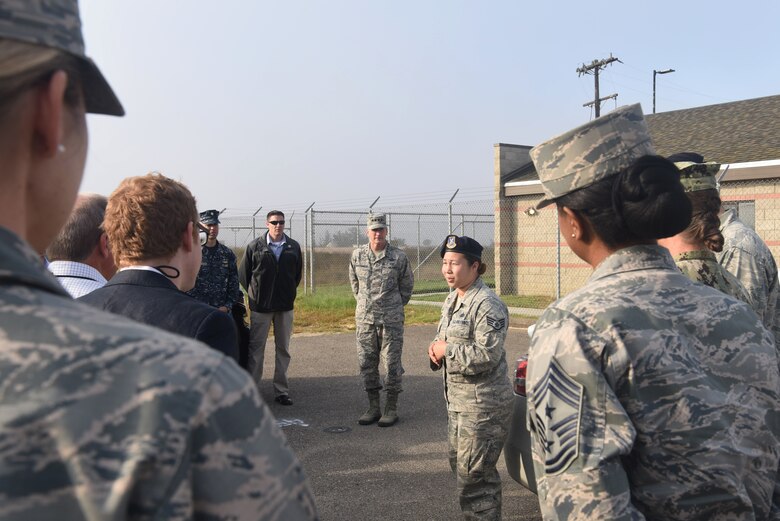 Staff Sgt. Angela Jones, 30th Security Forces Squadron K-9 trainer and supervisor, briefs Gen. Terrence J. O’Shaughnessy, commander of U.S. Northern Command and North American Aerospace Defense Command, and NORAD civic leaders on Aug. 8, 2018 at Vandenberg Air Force Base, Calif. (U.S. Air Force photo by Airman 1st Class Aubree Milks/Released)