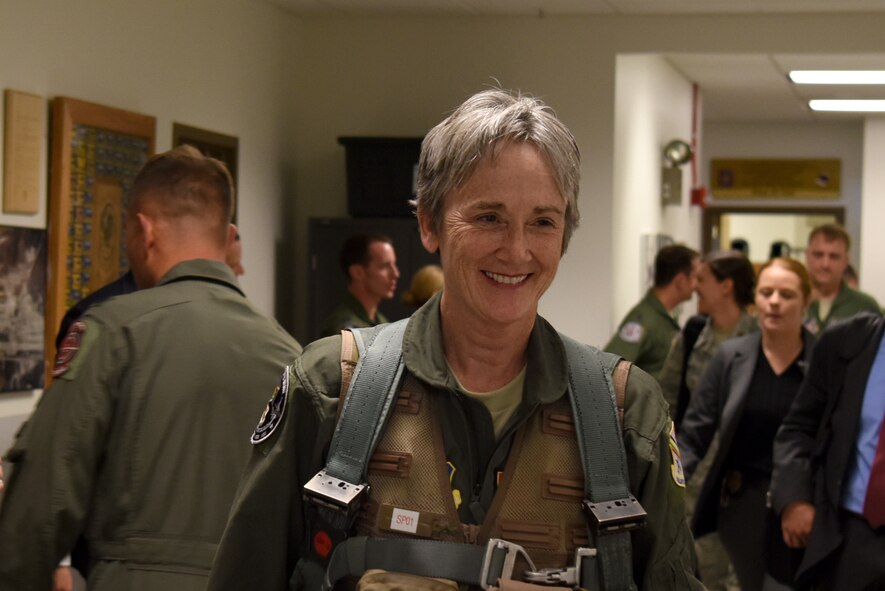 The Honorable Heather A. Wilson, the Secretary of the Air Force, smiles while walking out of the 18th Aggressor Squadron, Aug. 10, 2018, at Eielson Air Force Base, Alaska. Shortly after, Wilson flew in one of the 18th AGRS F-16 Fighting Falcons. (U.S. Air Force photo by Airman 1st Class Eric M. Fisher)