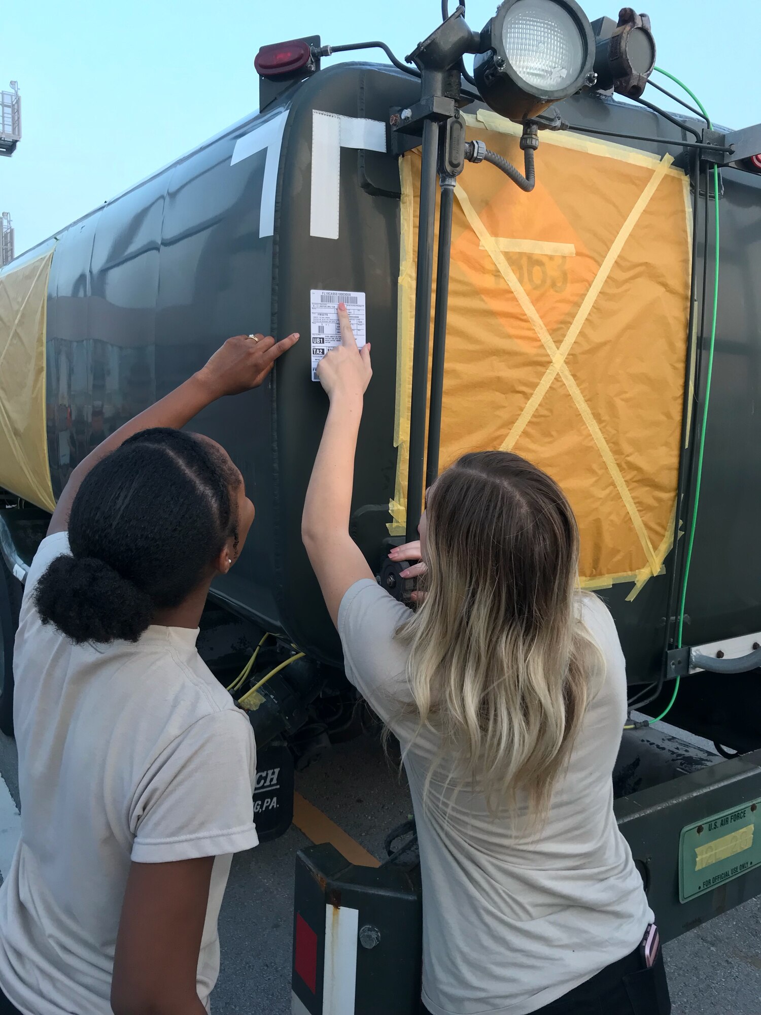 (On left) On 9 Aug., 927th Traffic Management Office technicians, Senior Airman Natassia Wilson and Staff Sgt. Ashleigh Scienza ensured a shipment of R-11 Refueler trucks were correctly marked for shipping from Aja Port, Japan. 

 

Citizen Airmen from the 927th Logistics Readiness Squadron, MacDill Air Force Base, Florida, traveled to Kadena Air Base, Japan to perform their two-week annual training and work alongside their active duty counterparts from the 18th LRS. (U.S. Air Force photo by Master Sgt. Thomas Berger)
