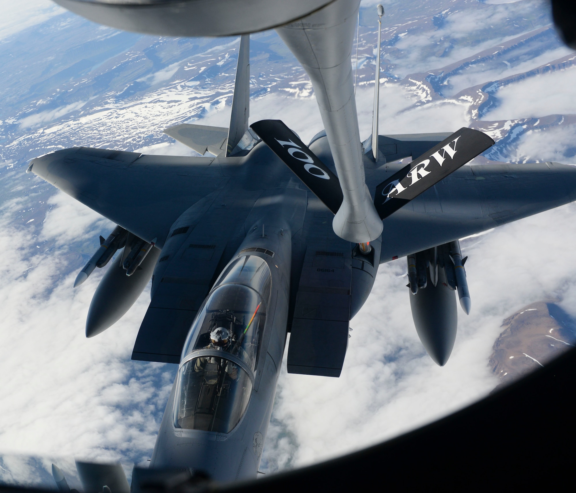 A U.S. Air Force F-15C Eagle assigned to the 493rd Expeditionary Fighter Squadron receives fuel from a KC-135 Stratotanker assigned to the 351st Air Refueling Squadron over Iceland, Aug. 10, 2018. Successful international operations are a testament to the cooperative efforts and enduring relationship between the U.S., allies and partner nations. (U.S. Air Force photo by Airman 1st Class Alexandria Lee)