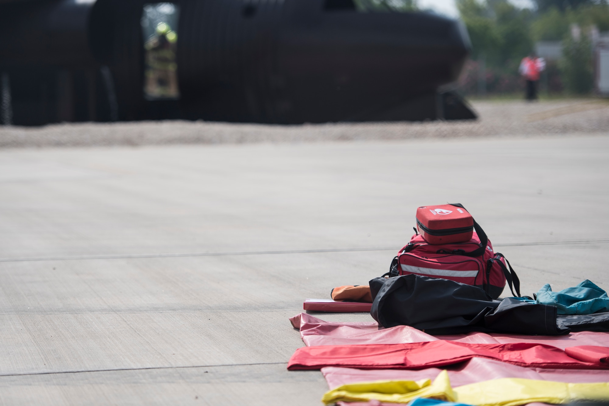 Equipment for simulated casualties lays ready during a simulated aircraft fire at Incirlik Air Base, Turkey, Aug. 7, 2018