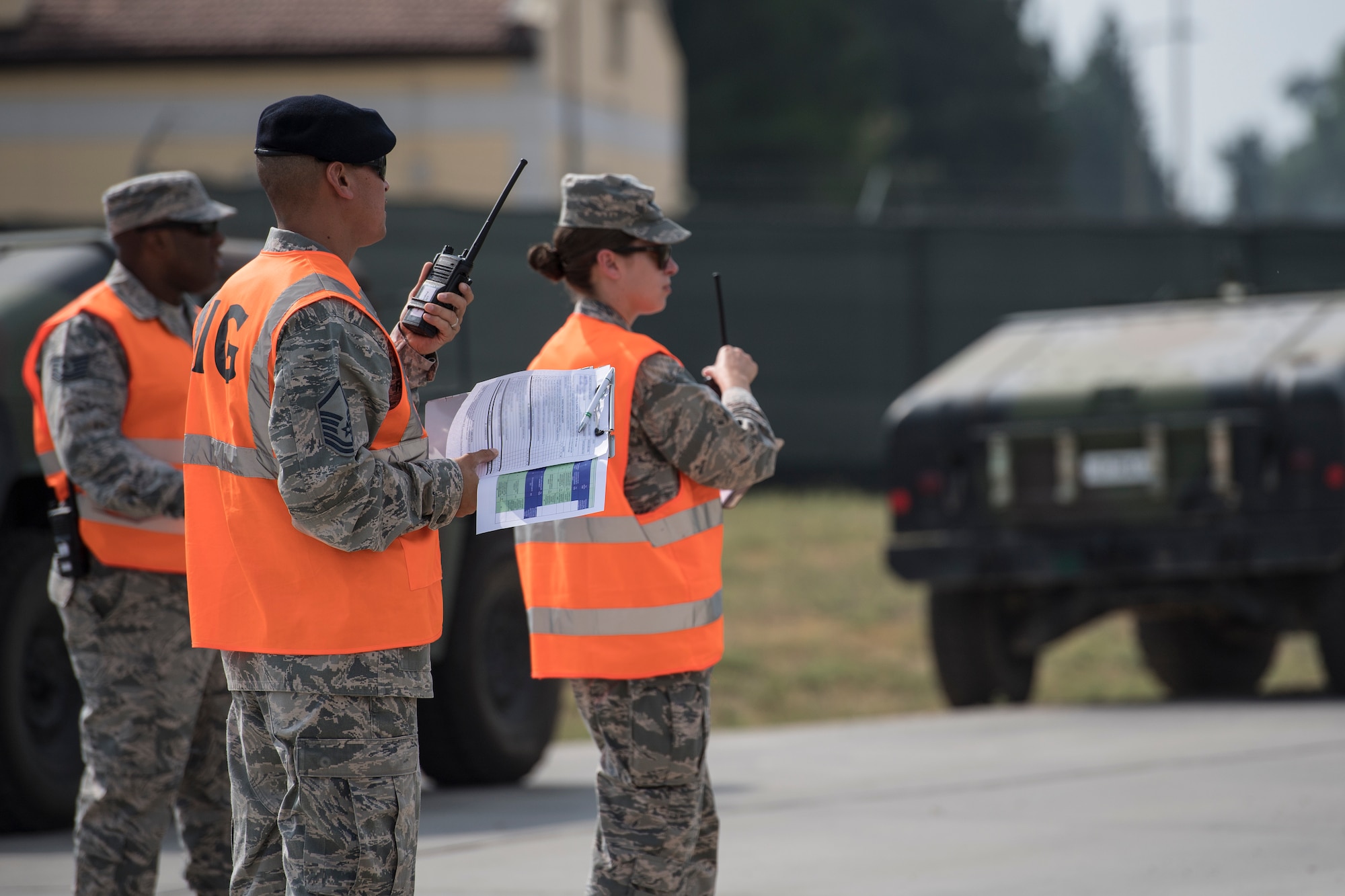 Members of the Inspector General's team observe a simulated aircraft fire at Incirlik Air Base, Turkey, Aug. 7, 2018
