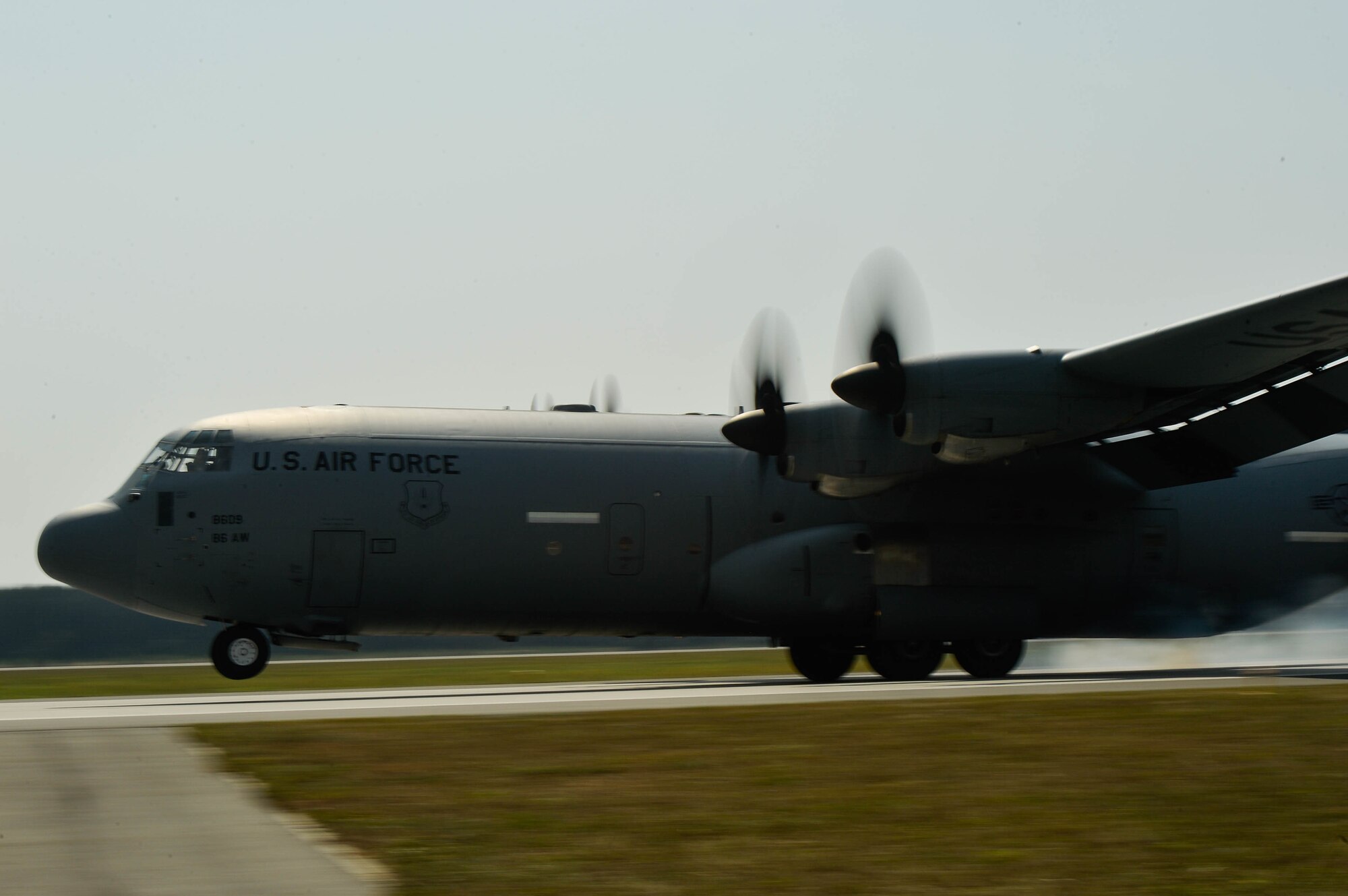 A U.S. Air Force C-130J Super Hercules assigned to the 37th Airlift Squadron lands on Powidz Air Base, Poland, Aug. 9, 2018. Airmen and aircraft assigned to the 37th Airlift Squadron conduct bilateral training exercises in Poland annually. (U.S. Air Force photo by Senior Airman Joshua Magbanua)