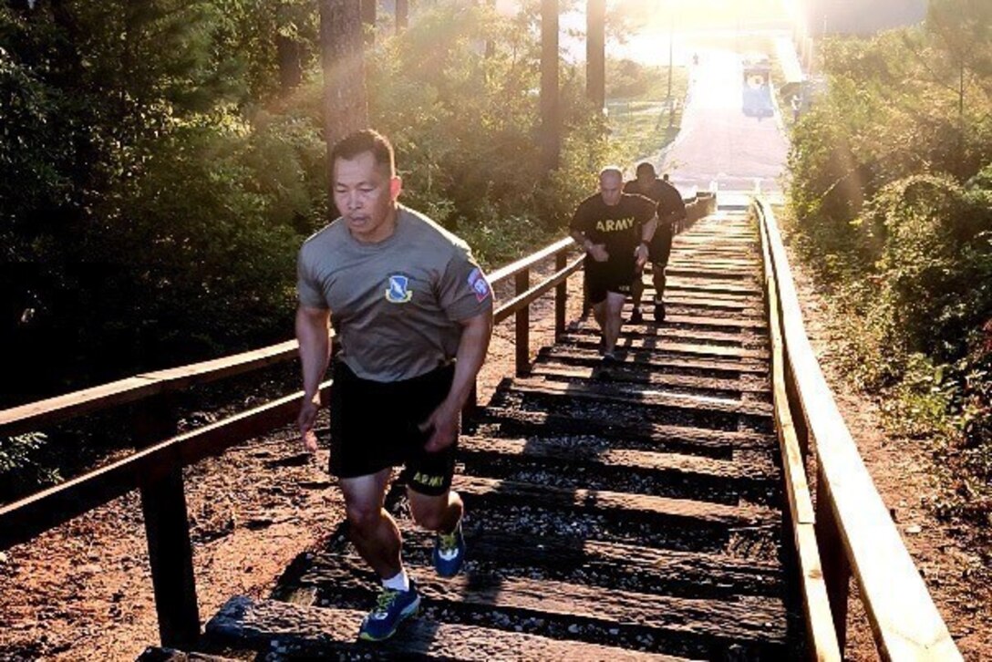 Army Command Sgt. Maj. Thinh Huynh runs stairs during physical training at Fort Bragg, N.C., Aug. 1, 2018. Army photo by Spc. Alleea Oliver