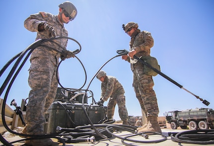 Army Reserve Soldiers conduct decontamination operations with 1st Armored Division