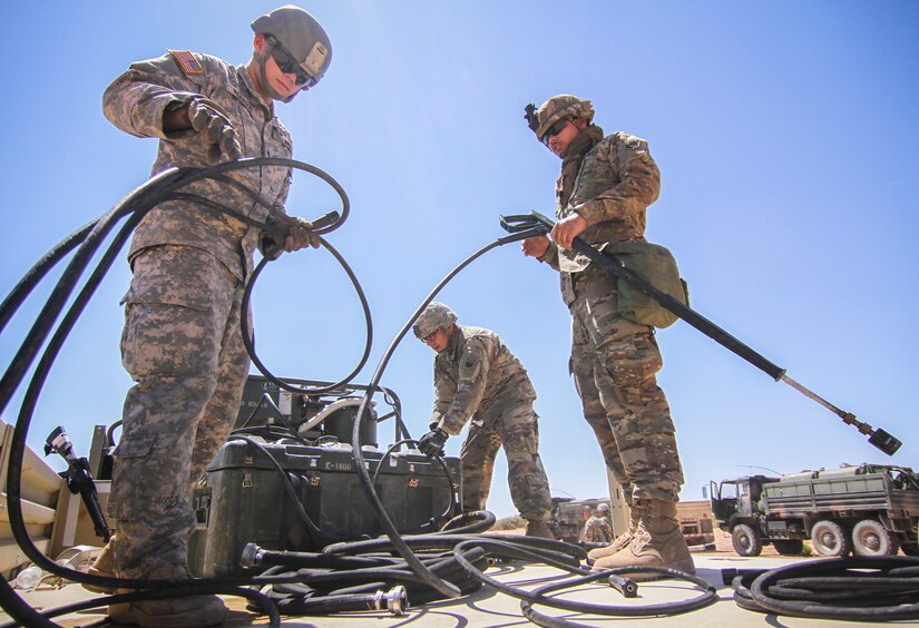 Army Reserve Soldiers conduct decontamination operations with 1st Armored Division