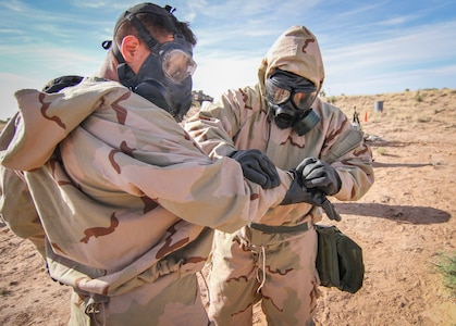 Army Reserve Soldiers conduct decontamination operations with 1st Armored Division