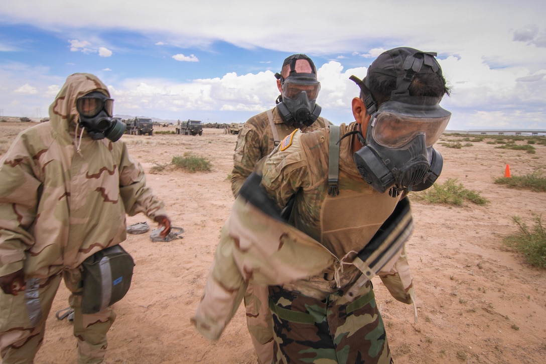 Army Reserve Soldiers conduct decontamination operations with 1st Armored Division