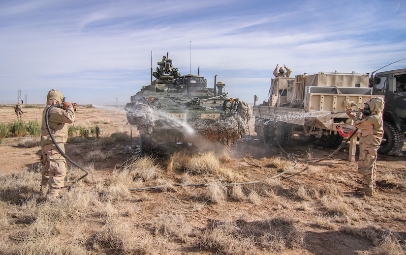 Army Reserve Soldiers conduct decontamination operations with 1st Armored Division