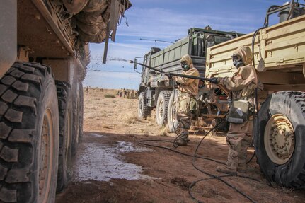 Army Reserve Soldiers conduct decontamination operations with 1st Armored Division