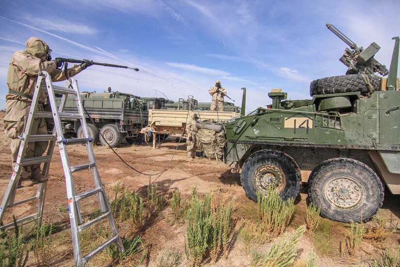 Army Reserve Soldiers conduct decontamination operations with 1st Armored Division