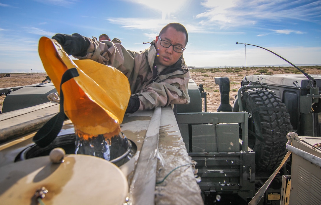 Army Reserve Soldiers conduct decontamination operations with 1st Armored Division