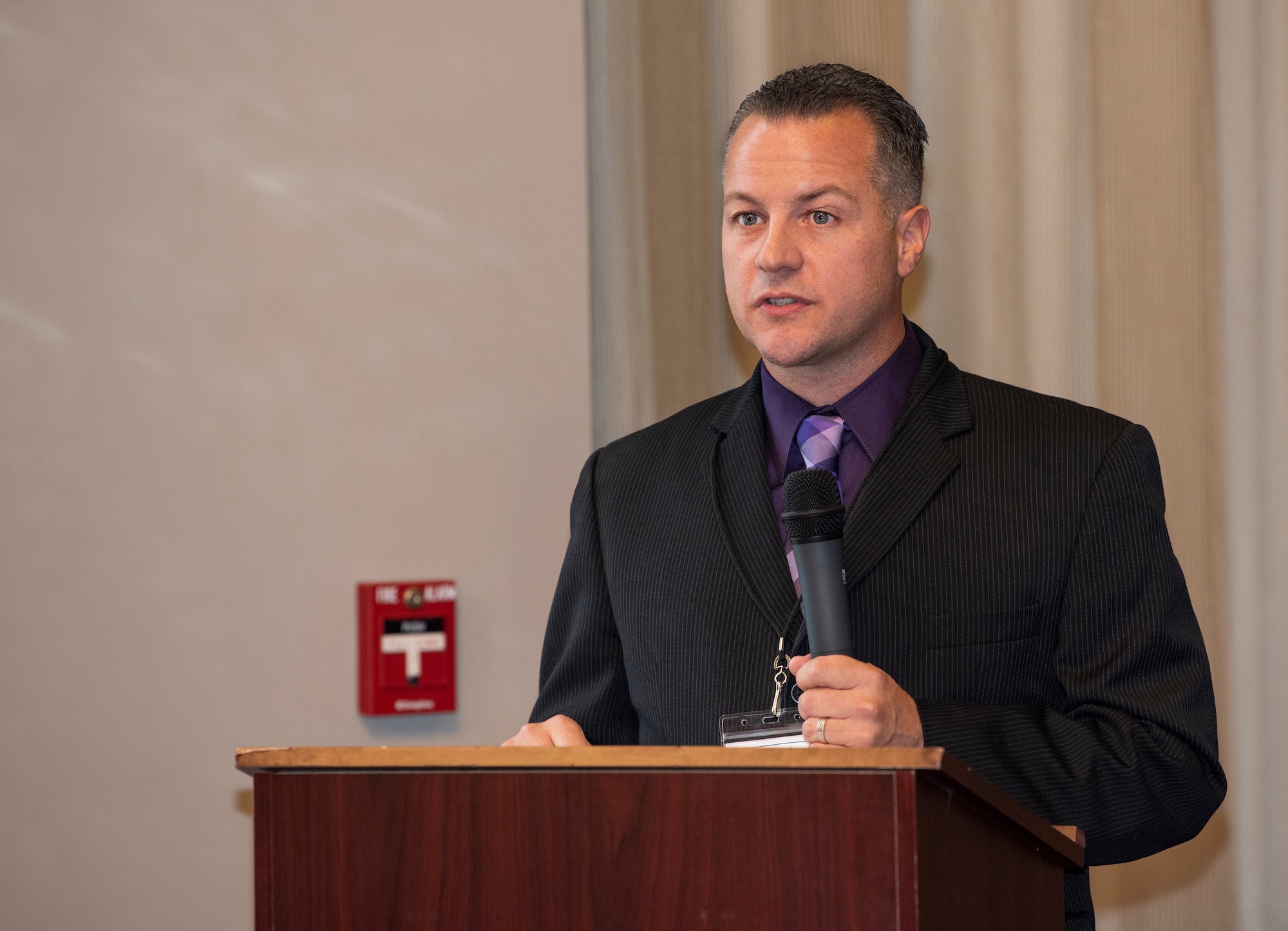 Lt. Col. James Hogan, 7th Space Operations Squadron commander, welcomes attendees to the 7 SOPS 25th Anniversary event in downtown Colorado Springs, Aug. 4th, 2018.