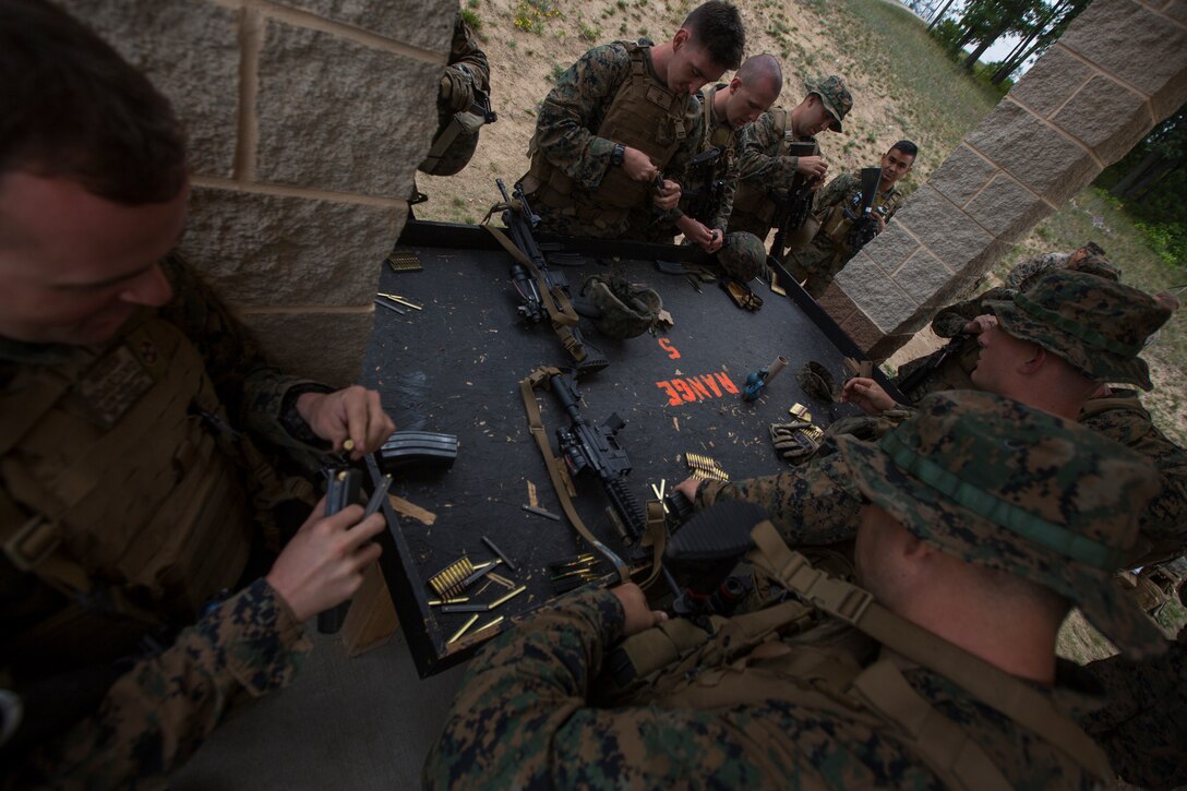 Marines from India Company, 3rd Battalion, 25th Marine Regiment, prepare for a live-fire range with Amphibious Assault Vehicles support during Exercise Northern Strike at Camp Grayling, Mich., Aug. 8, 2018. Northern Strike’s mission is to exercise participating units’ full-spectrum of capabilities through realistic, cost-effective joint fires training in an adaptable environment, with an emphasis on joint and coalition force cooperation. (U.S. Marine Corps photo by Cpl. Niles Lee)