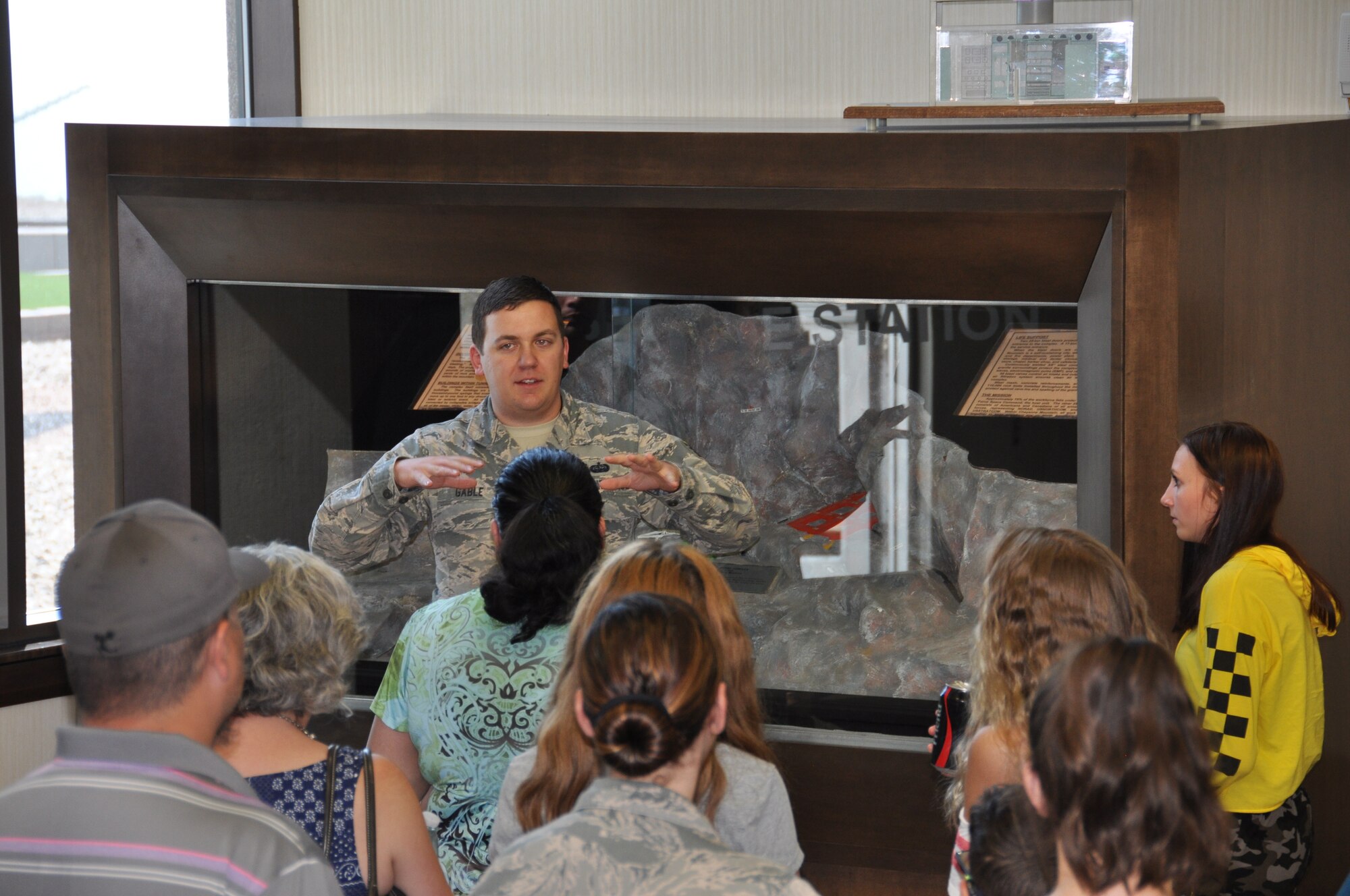 Staff Sgt. Evan Gable explains how the Cheyenne Mountain Complex was built inside a mountain during the Cold War. Spouses and significant others from the 14th Test Squadron toured the secretive base August 4, 2018.