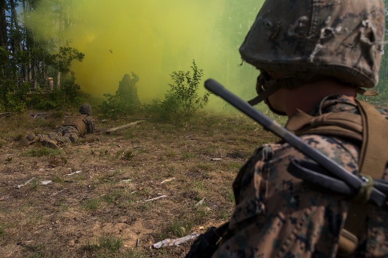 Marines from India Company, 3rd Battalion, 25th Marine Regiment, observe as combat engineers clear an obstacle during a live-fire range at Camp Grayling, Mich., Aug. 8, 2018. Northern Strike’s mission is to exercise participating units’ full-spectrum of capabilities through realistic, cost-effective joint fires training in an adaptable environment, with an emphasis on joint and coalition force cooperation. (U.S. Marine Corps photo by Cpl. Niles Lee)