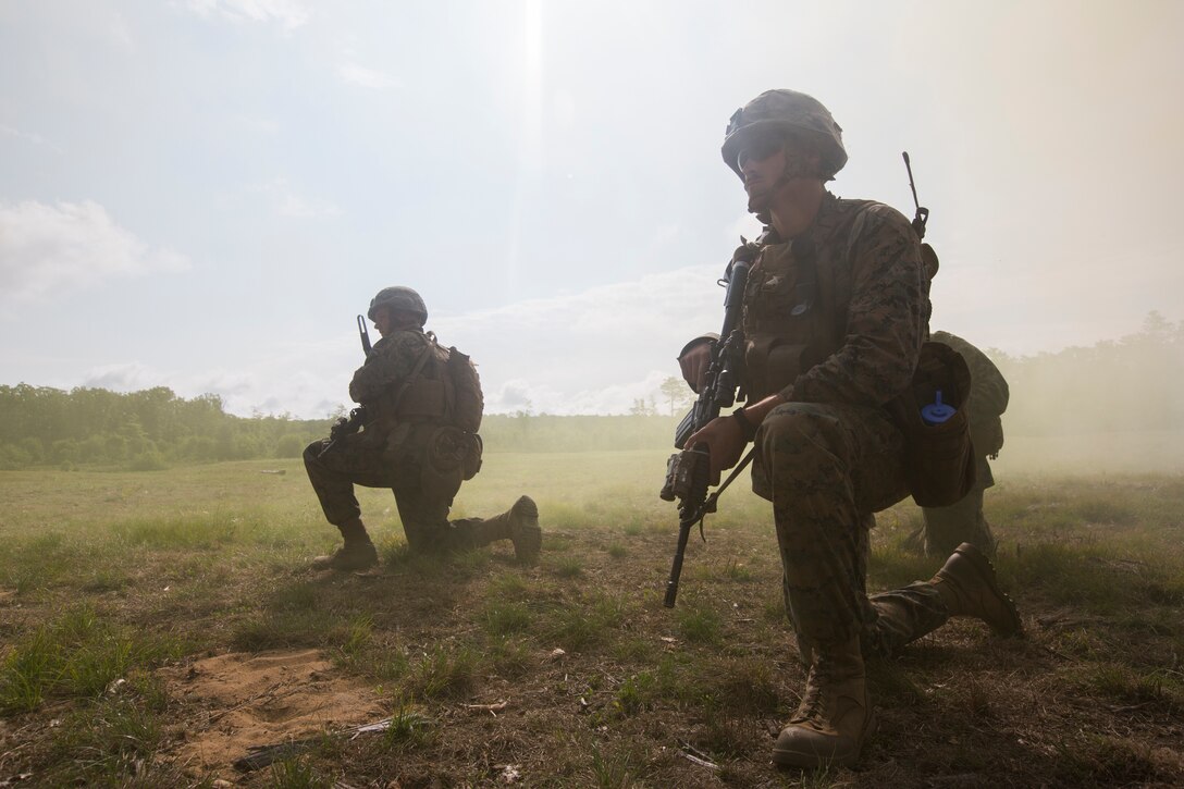 Marines from India Company, 3rd Battalion, 25th Marine Regiment, provide security as combat engineers clear an obstacle during a live-fire range at Camp Grayling, Mich., Aug. 8, 2018. Northern Strike’s mission is to exercise participating units’ full-spectrum of capabilities through realistic, cost-effective joint fires training in an adaptable environment, with an emphasis on joint and coalition force cooperation. (U.S. Marine Corps photo by Cpl. Niles Lee)