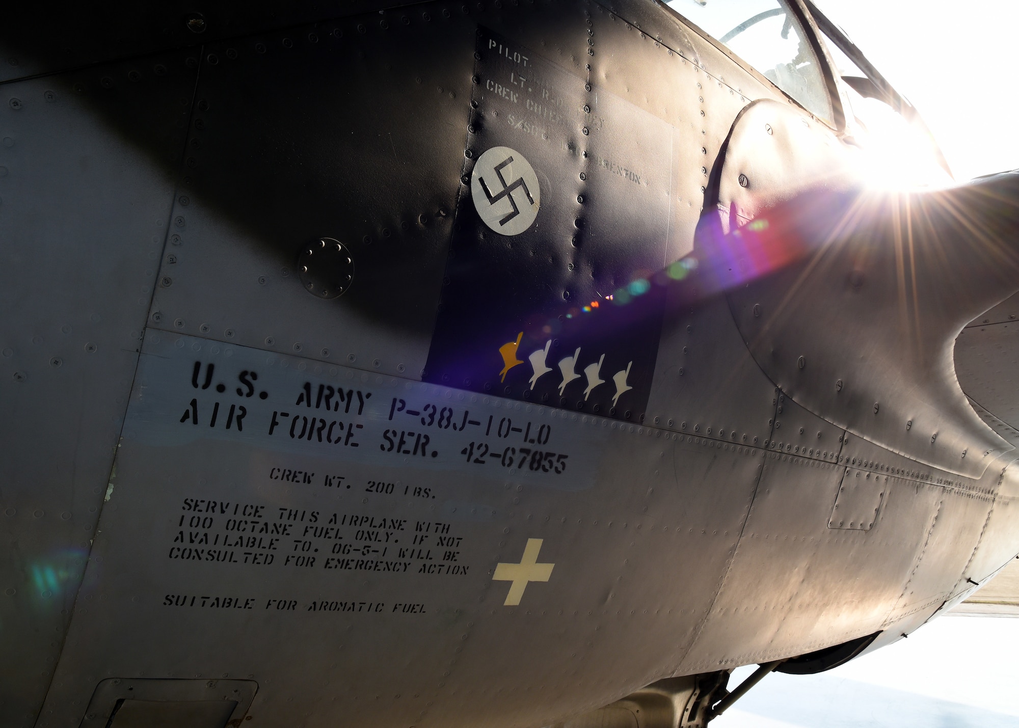 A view of the Lockheed P-38L Lightning before restoration crews at the National Museum of the U.S. Air Force moved the aircraft into the WWII Gallery on Aug. 13, 2018. Several WWII era aircraft on display were temporarily placed throughout the museum to provide adequate space for the Memphis Belle exhibit opening events. (U.S. Air Force photo by Ken LaRock)