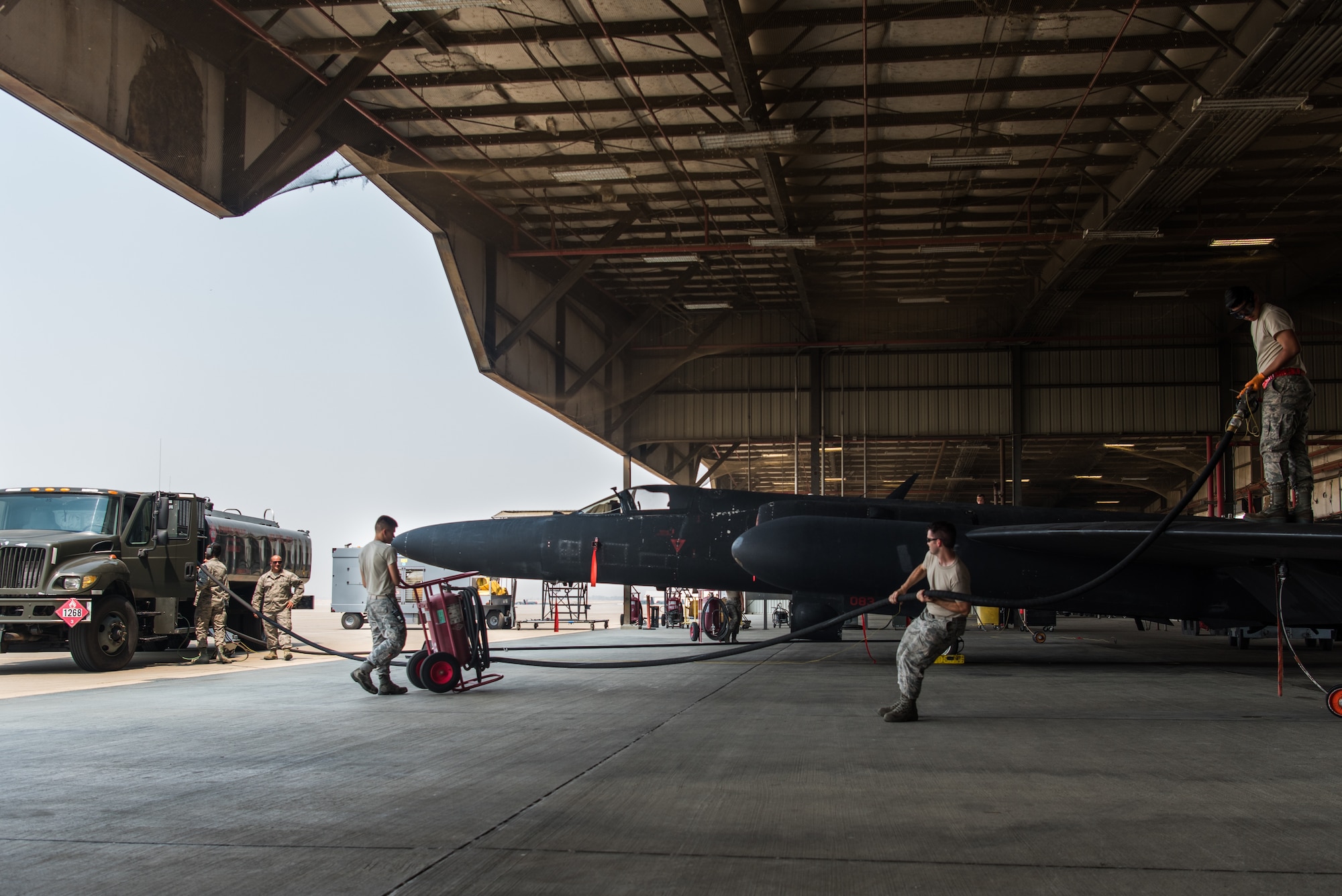 Airmen with the 9th Logistics Readiness Squadron and the 9th Aircraft Maintenance Squadron refuel a U-2 Dragon Lady at Beale Air Force Base, California, Aug. 9, 2018. Beale Airmen are responsible for maintaining and operating reconnaissance platforms such as the RQ-4 Global Hawk and U-2. (U.S. Air Force photo by Senior Airman Justin Parsons)