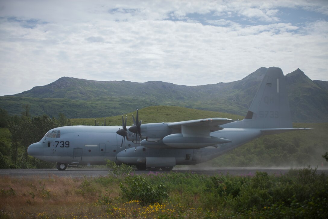 Col. Charles Moses, the commanding officer of Marine Air Group 41, 4th Marine Aircraft Wing lands a C-130 during Innovative Readiness Training Old Harbor, Alaska, Aug. 6, 2018. This year marks the completion of the 2,000-foot extension of Old Harbor’s runway. (U.S. Marine Corps photo by Lance Cpl. Tessa D. Watts)
