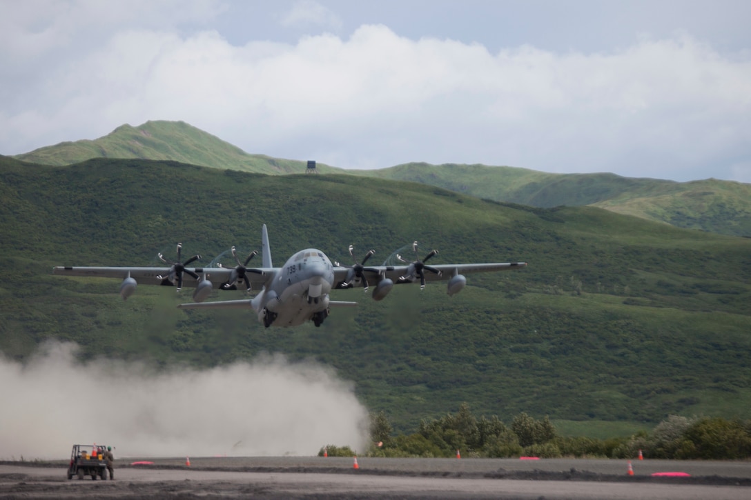 Col. Charles Moses, the commanding officer of Marine Air Group 41, 4th Marine Aircraft Wing lands a C-130 during Innovative Readiness Training Old Harbor, Alaska, Aug. 6, 2018. This year marks the completion of the 2,000-foot extension of Old Harbor’s runway. (U.S. Marine Corps photo by Lance Cpl. Tessa D. Watts)