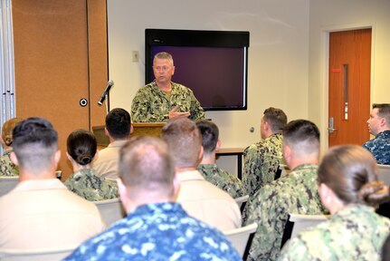 Navy Medicine East Command Master Chief Michael Hinkle speaks to Sailors of Naval Health Clinic Charleston Aug. 7, 2018, about the future of military medicine.