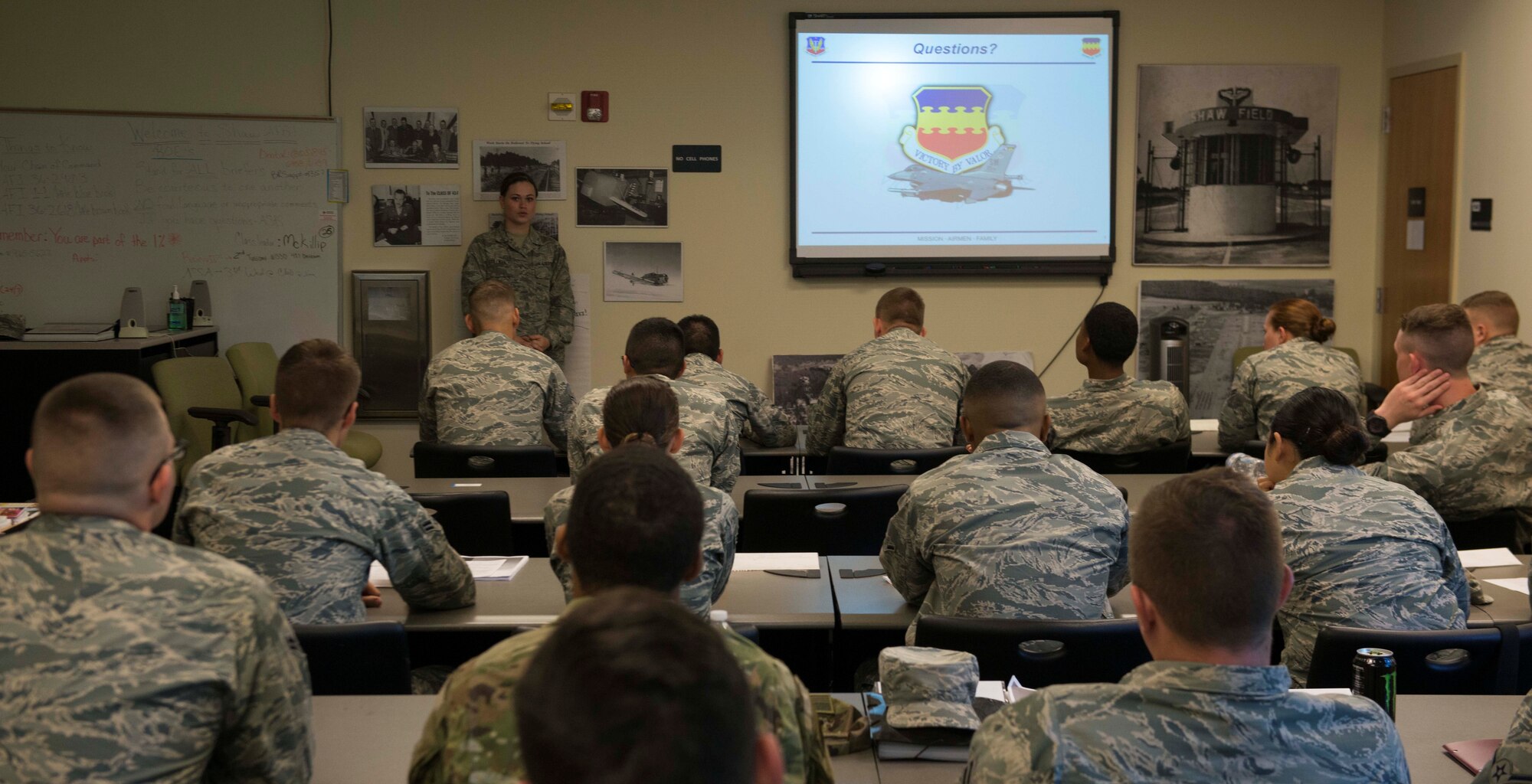 U.S. Airman 1st Class BrieAnna Stillman, 20th Fighter Wing public affairs photojournalist journeyman, answers questions at Shaw Air Force Base, S.C., Aug. 9, 2018.