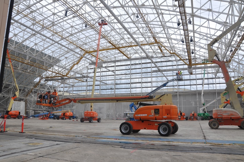 Contractors from New South Construction work to renovate a 1940s era hangar on Robins Air Force Base, July 25. The 14.7 acre complex is the largest in the country and houses C-5 Galaxy, C-130s and F-15 aircraft.