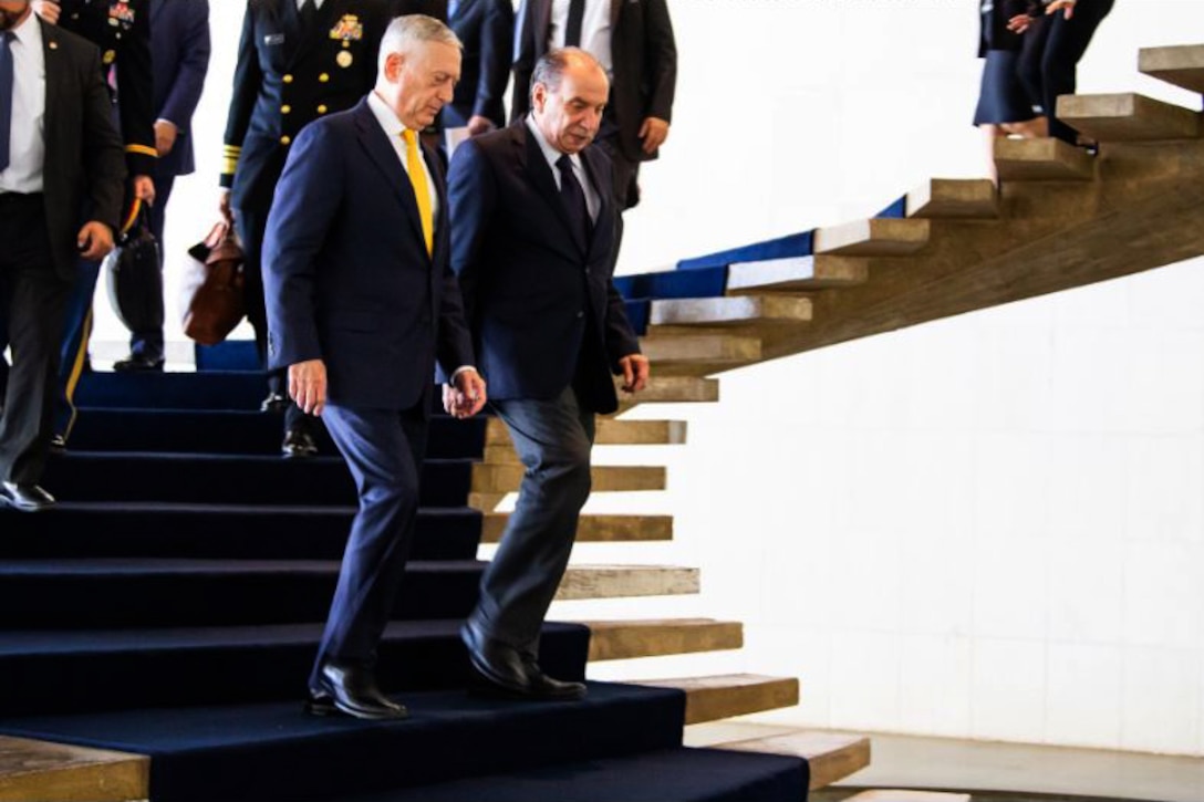 Defense Secretary James N. Mattis walks down steps with Foreign Minister Aloysio Nunes of Brazil.