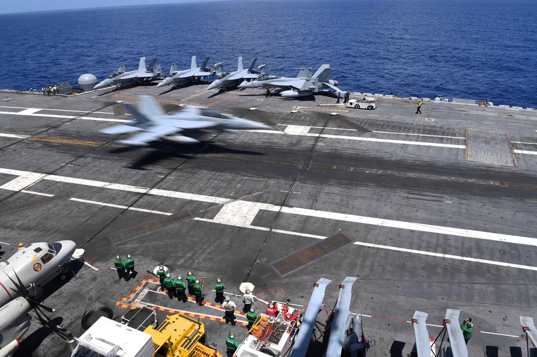An F/A-18 Super Hornet makes a landing onto the USS Abraham Lincoln.
